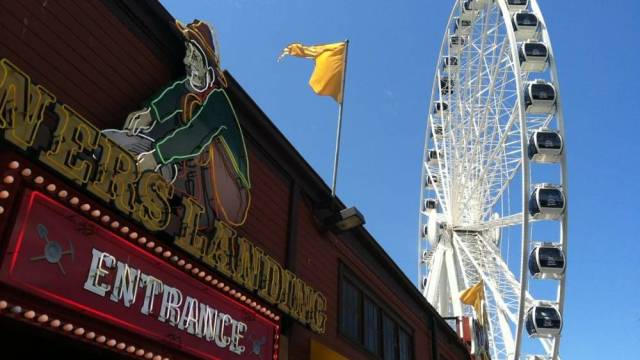 Miners Landing with the Great Wheel above at Seattle waterfron