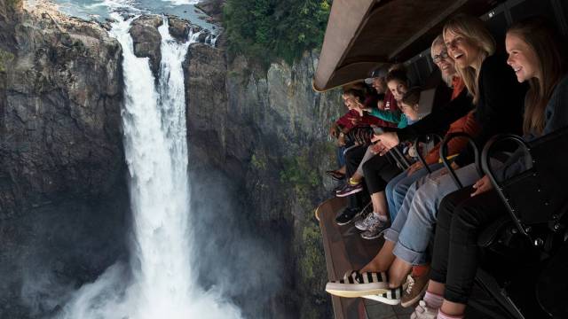 A family enjoys the Wings over washington experience on Seattle Waterfront