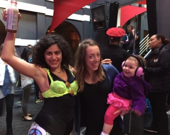 Women and infant dancing