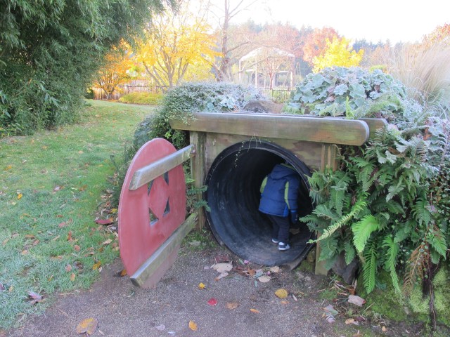 kid crawling in a hole