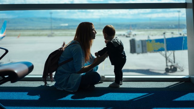 woman with toddler in airport