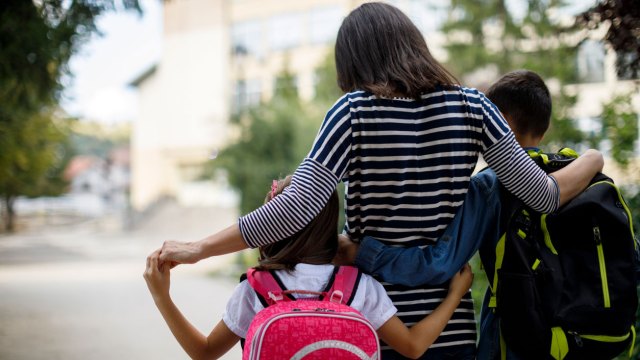 mom walking with kids
