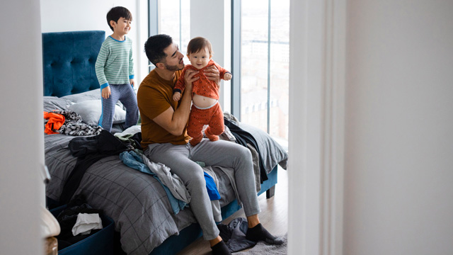 stay-home-dad with his kids