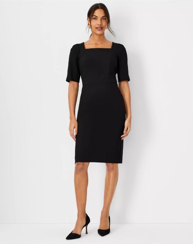 woman wearing black dress