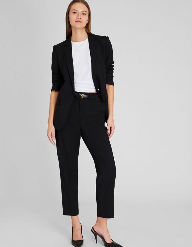 woman wearing black suit