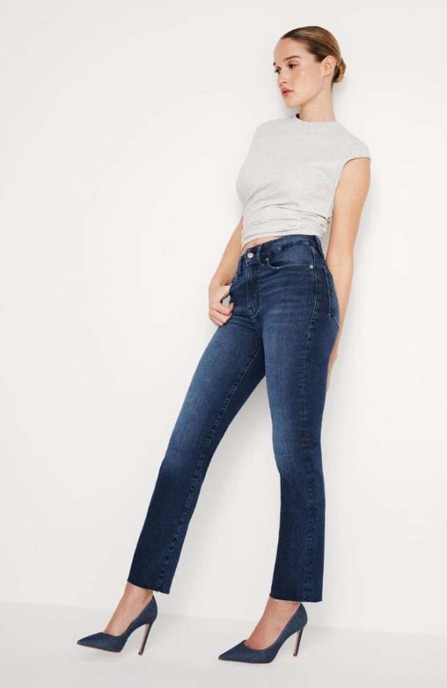 woman wearing dark wash jeans
