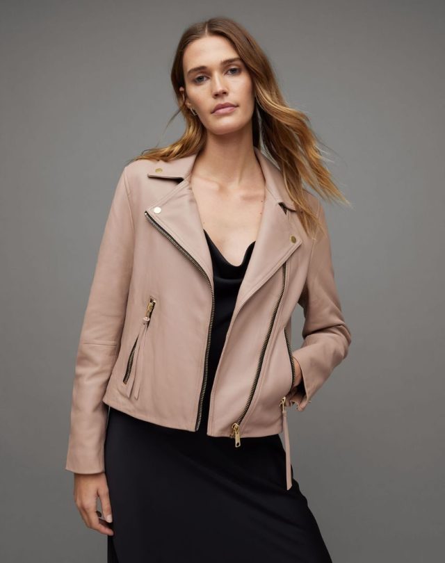 woman wearing tan moto jacket