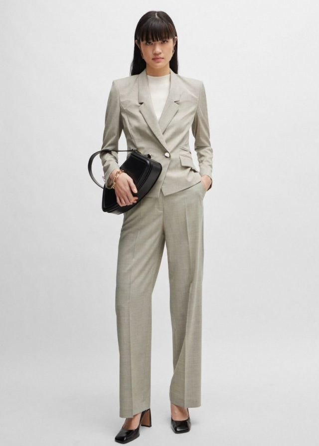 woman wearing beige suit