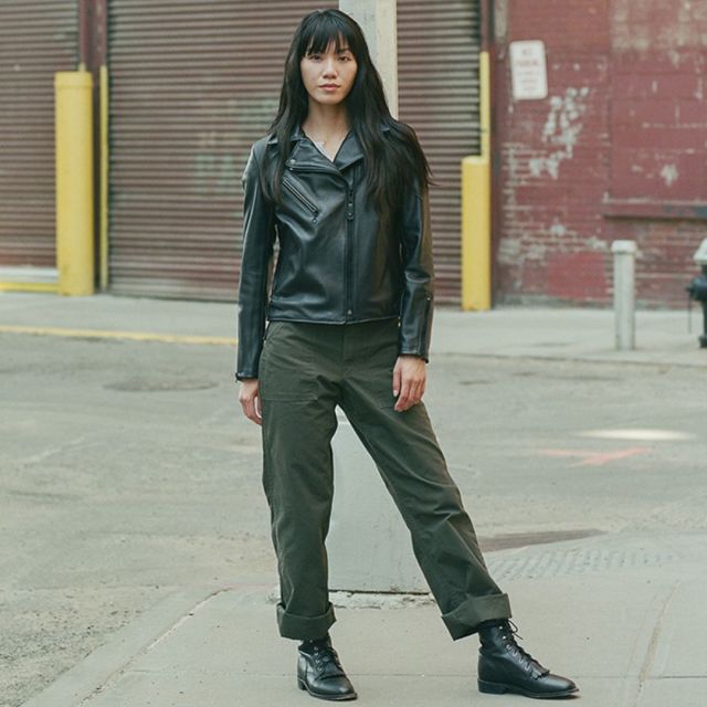 woman wearing black leather jacket