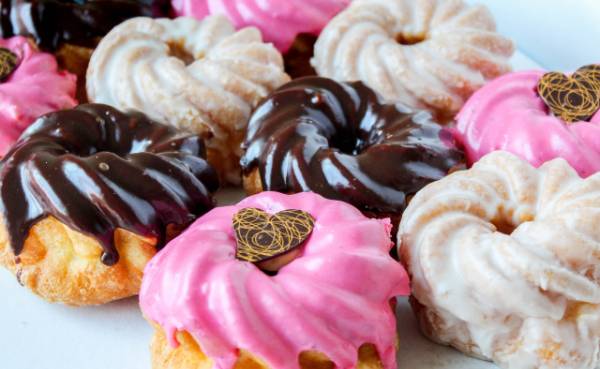 Strawberry, vanilla and chocolate donuts