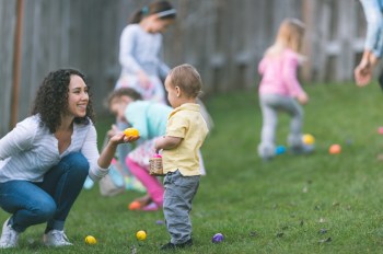 toddler at an easter egg hunt