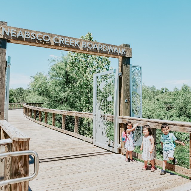 three children standing on the Neabsco Creek Boradwalk