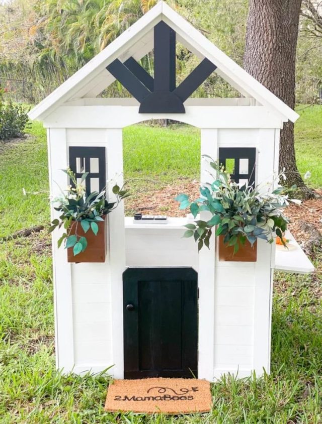 white farmhouse style playhouse