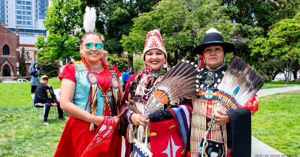 A Native American dance group performs at Yerba Buena