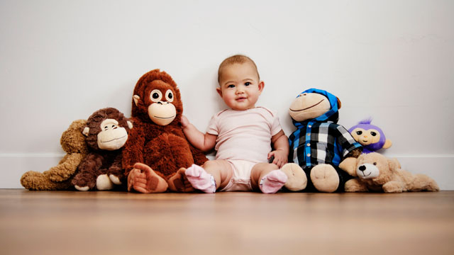 use stuffed animals as props in baby's first christmas card