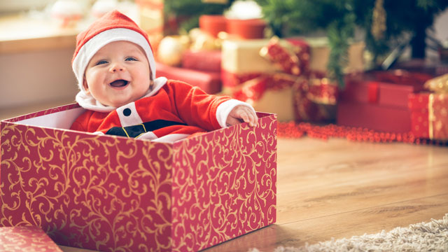 baby's first christmas card ideas: put baby in a gift box