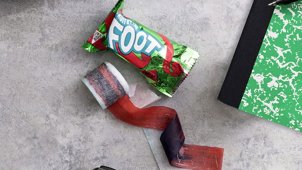 a good gingerbread house idea is to use fruit roll-ups for windows