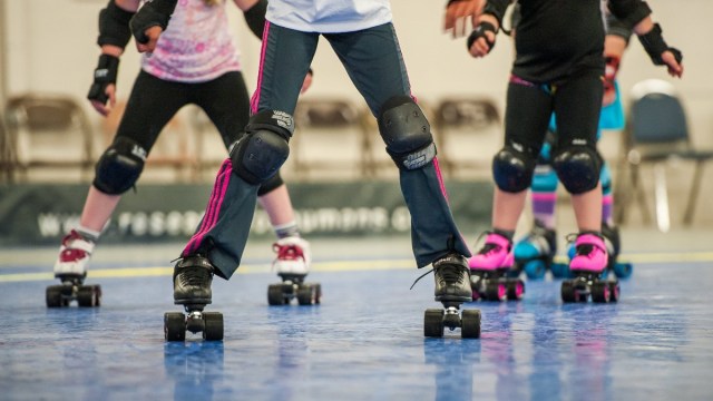 kids roller stake around a rink at portland new years eve