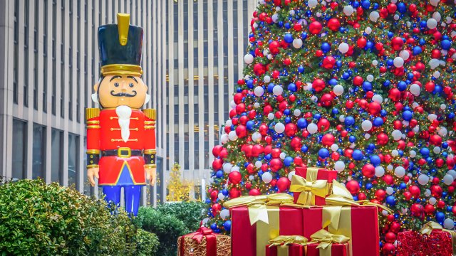 giant nutcracker and presents near Rockefeller Christmas Tree in New York City's Manhattan