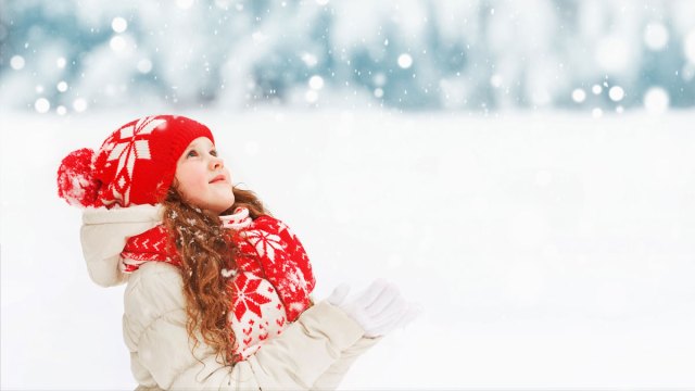 little girl outside learning about snowflake science