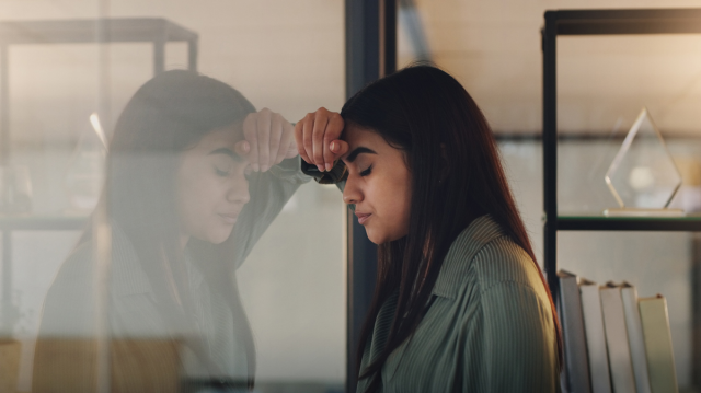 girl stressed in office