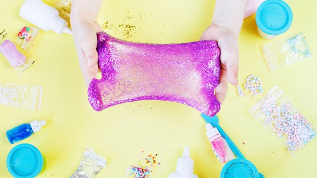 a picture of someone making slime videos for kids