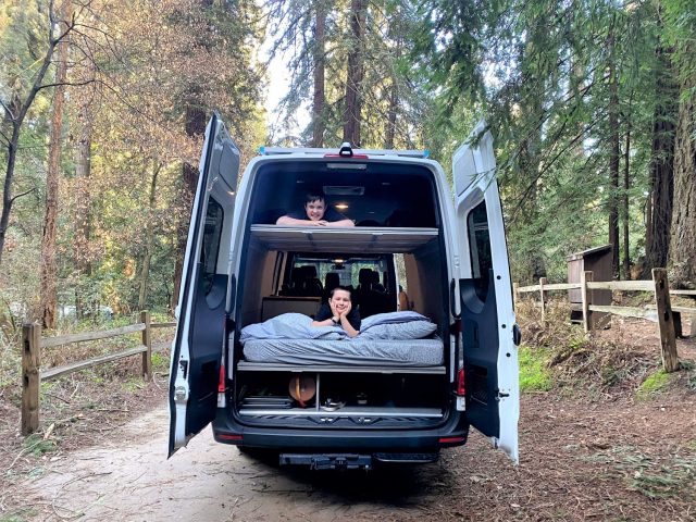 Kids in campvan on RV family road trip