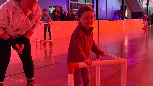 A little kid roller skates at Tacoma Skateworld, one of the Seattle's best roller skating rinks