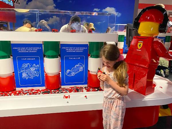 Girl Building with Legos at LEGOLAND Ferrari Build and Race