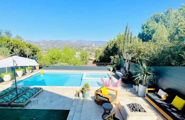 Pool with view and pink swan float.
