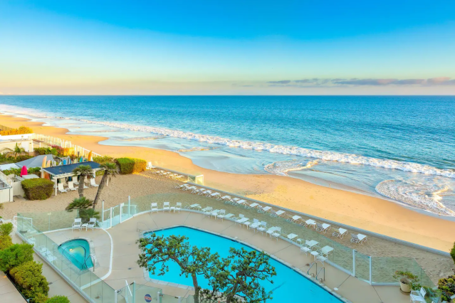 view of the ocean and a pool