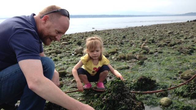 a girl and her father tidepool beach seattle explore