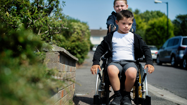 a little boy who's parents are raising a son with compassion for others
