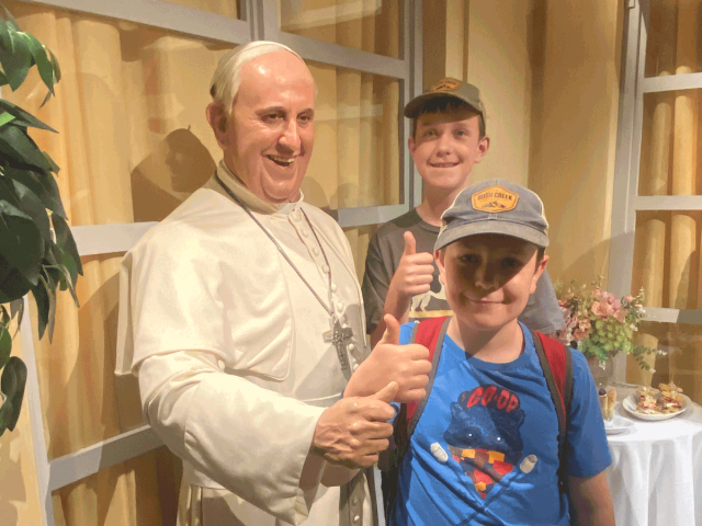 Kids with Pope Francis at paris Grevin Wax Museum