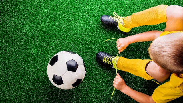 kid with soccer ball