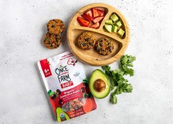 wooden plate featuring healthy food from Once Upon a Farm