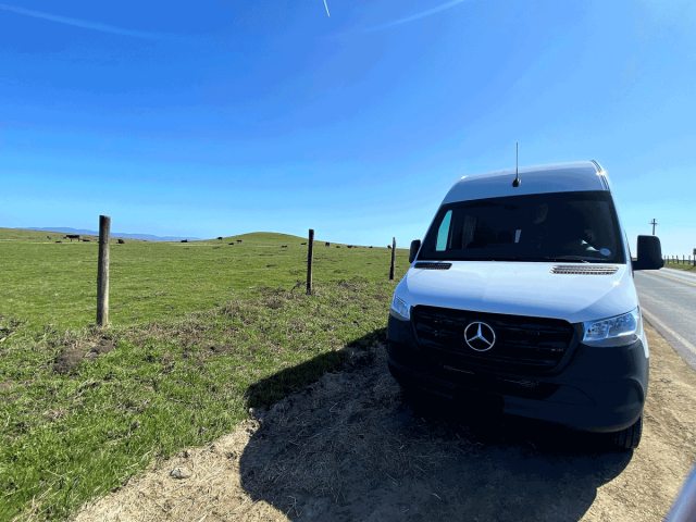 camper van next to a field