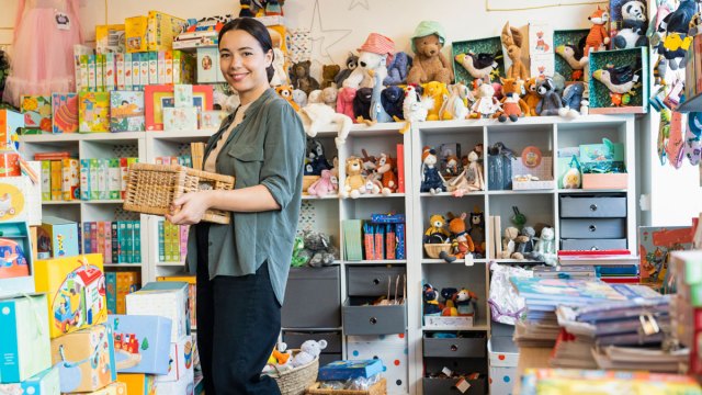 woman standing in toy store Dallas