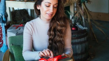 mom opening Christmas present
