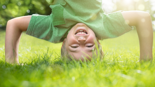 happy boy laughing at spring jokes