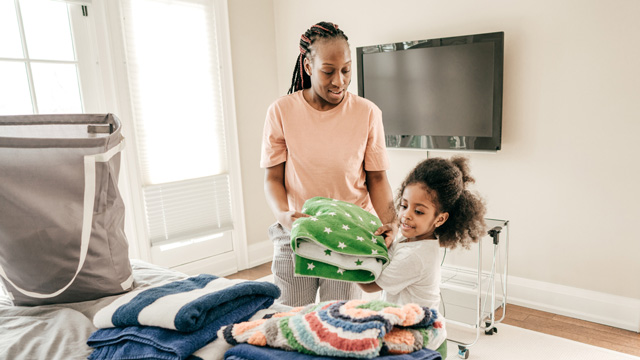 learning how to do laundry is a life skill for kids 