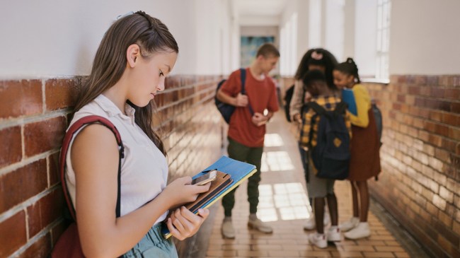 a girl dealing with different types of cyberbullying parents need to know about