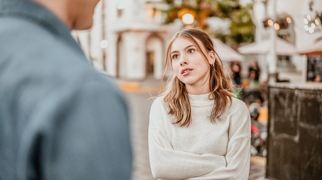 girl talking back to her father