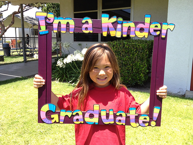 A cute diy frame from Apples and ABCs is one of our favorite first day of school picture ideas