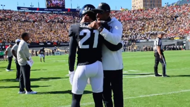 deion sanders coaching his son for a story on how he ranks his children