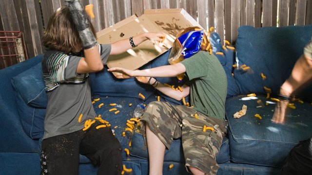 teen boys in a messy food fight