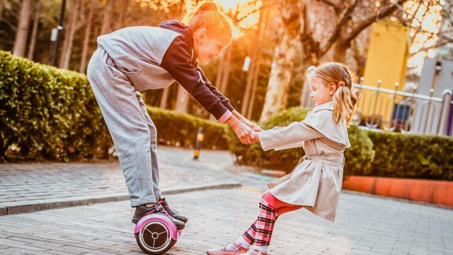 a girl on a dangerous toy, a hoverboard, for a story on the top toys that land kids in the ER