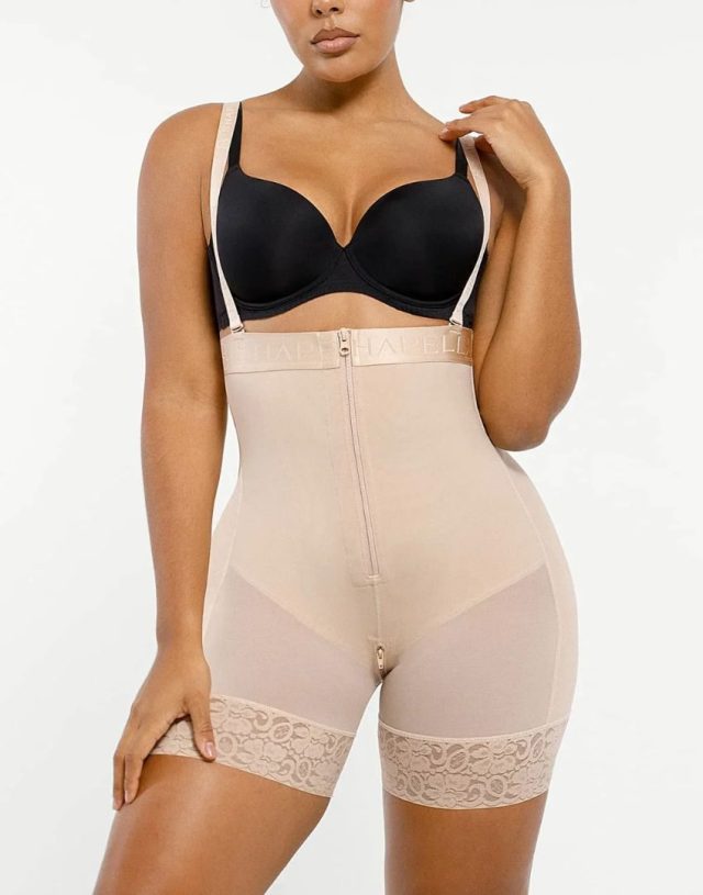 woman wearing cream colored high waist shaping shorts