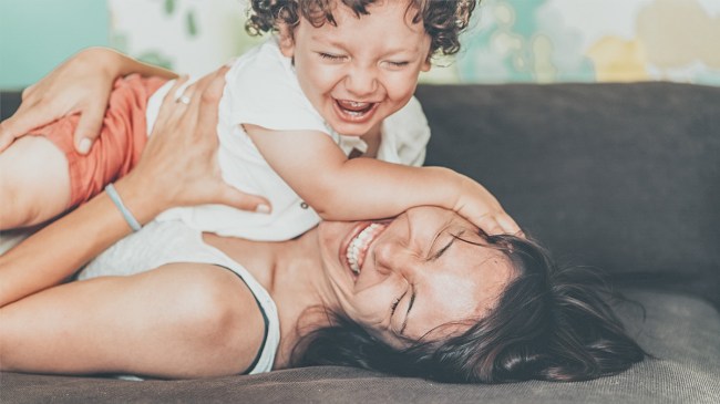 a toddler playing with his mom for a story on things toddler parents should give up