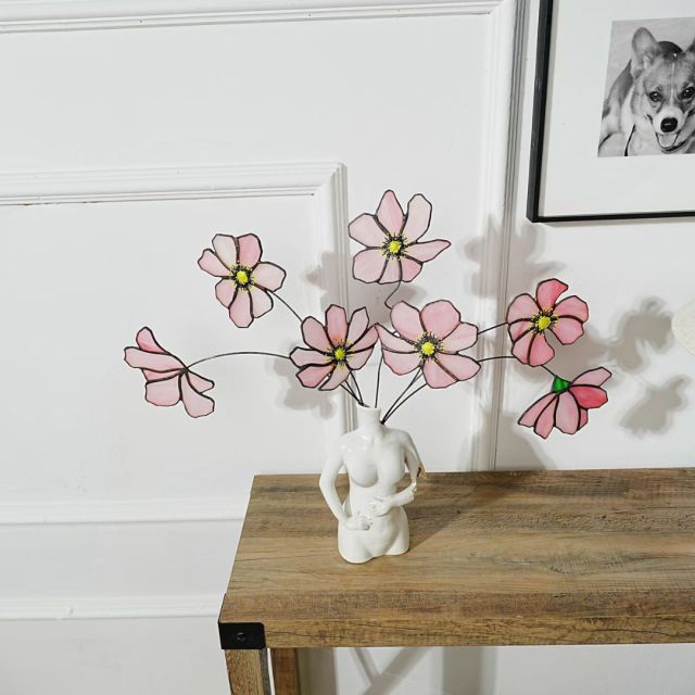 stained glass flowers in vase on table